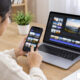 creator browsing video templates on a phone and laptop